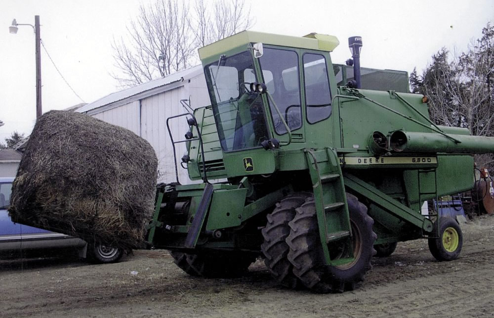 Combine Snowplow Doubles As A Bale Mover